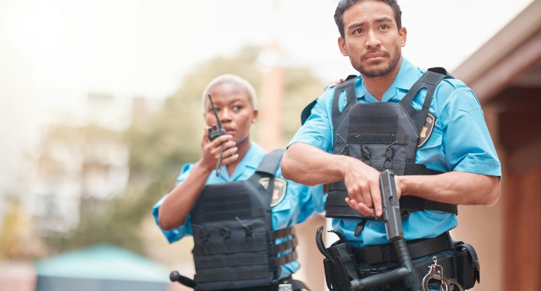 Crime, team and police with an investigation together for security, law and neighborhood safety. Se